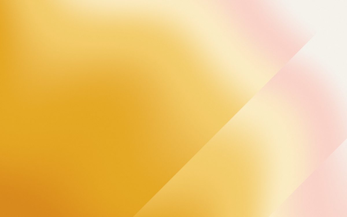 A gold to pale pink gradient with two sharp diagonal edges of light